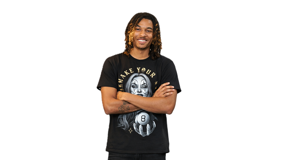 T'Montez Hurt standing upright in a full-body portrait with crossed arms against a clean white background.